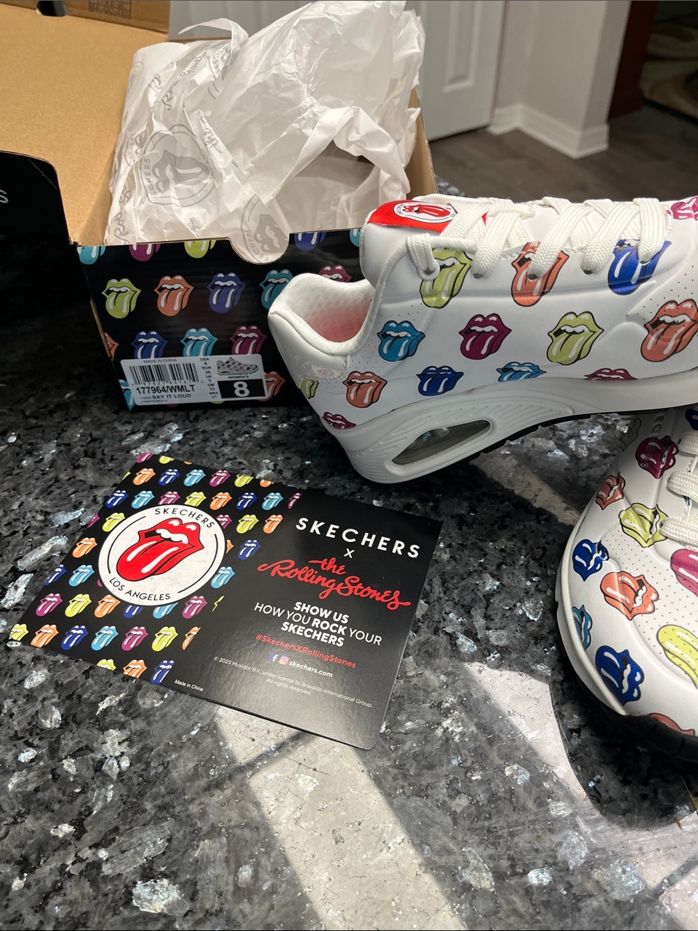 Skechers White Leather Sneakers with Multicolor Rolling Stones Tongue Print